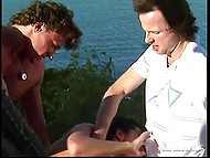 French brunette dame has fun outdoors with two young guys that fuck her in all holes