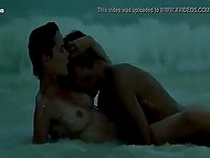 Scene of tender sex on the beach starring famous actress Sylvia Kristel and her colleague
