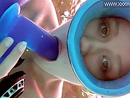 Teenage aqualunger with fragile body swims underwater and sucks dildo alone