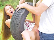 Tire swing plays a very important role in outdoor sex of beautiful young couple
